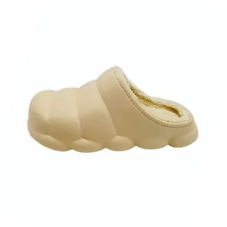 Single beige slipper with a padded, segmented design and a cozy fleece lining, on a white background.