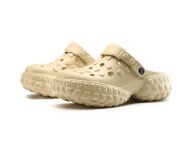 A pair of beige cloud clogs 400x310