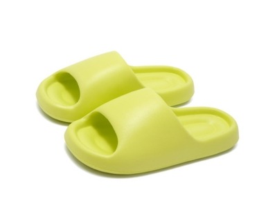 A pair of light green cloud bread slippers