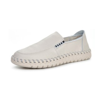 White moccasin-style leather casual shoe with visible stitching.